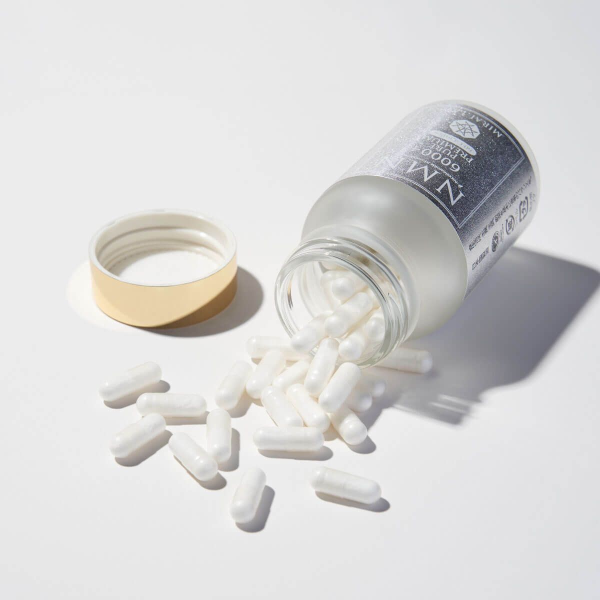 bottle containing 60 capsules of mirai lab's nmn 6000 pure supplement 